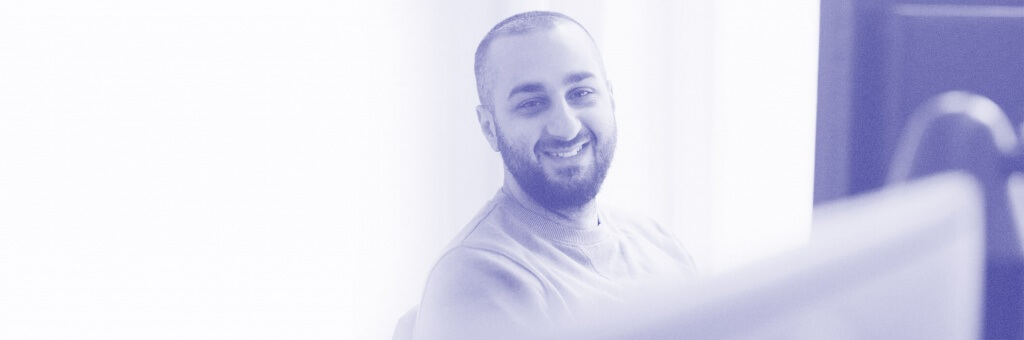 Developer Omar at his desk.