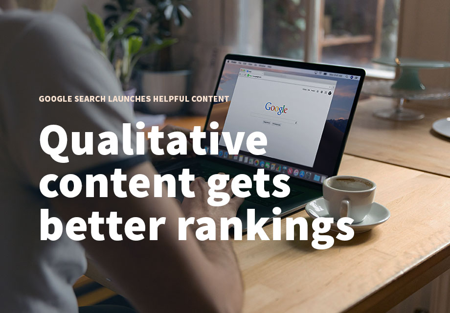 A person is using Google Search on a laptop