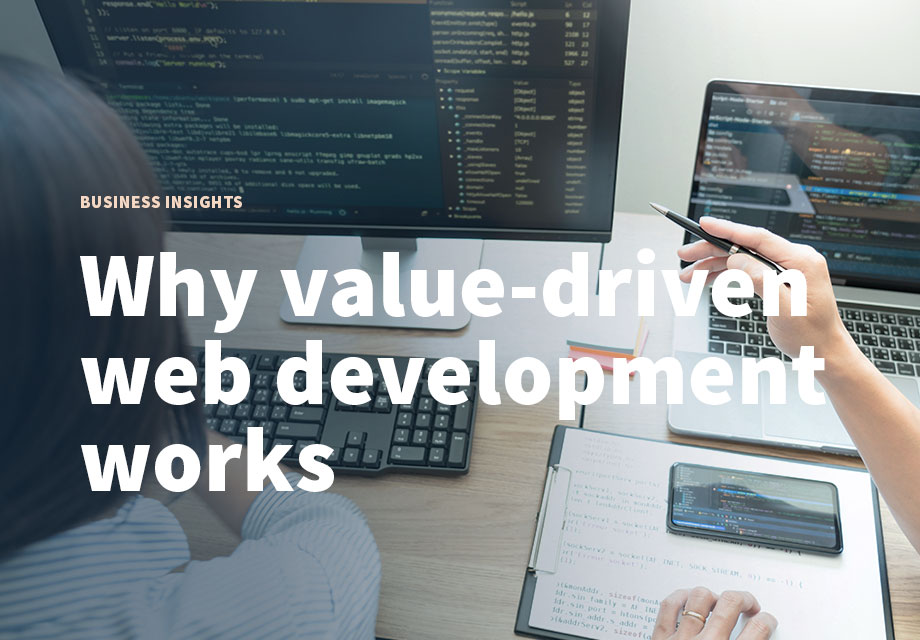 Two developers analyzing code.