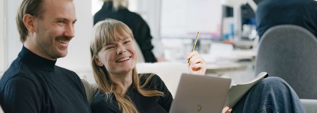 a man and a woman laughing